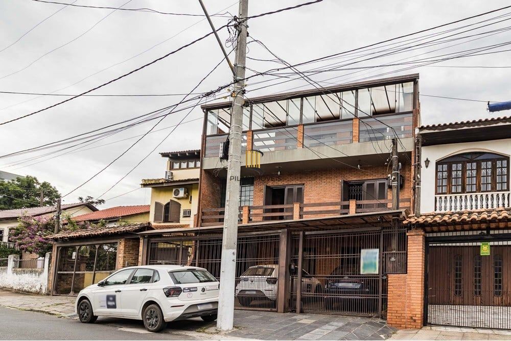 Casa 3 dormitórios no bairro Partenon