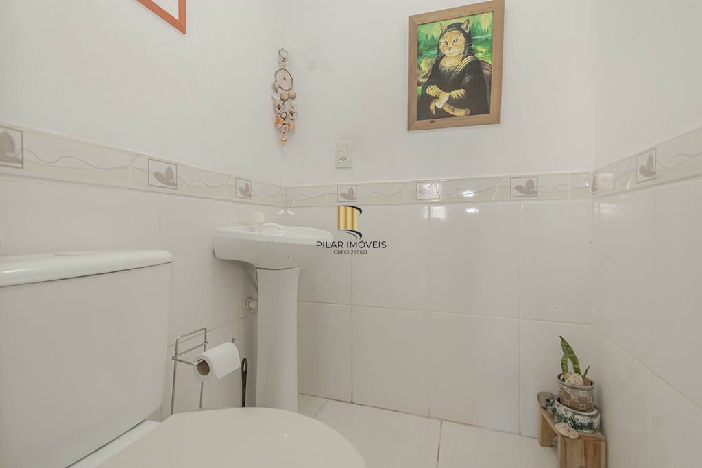 Casa 3 dormitórios no bairro Guarujá