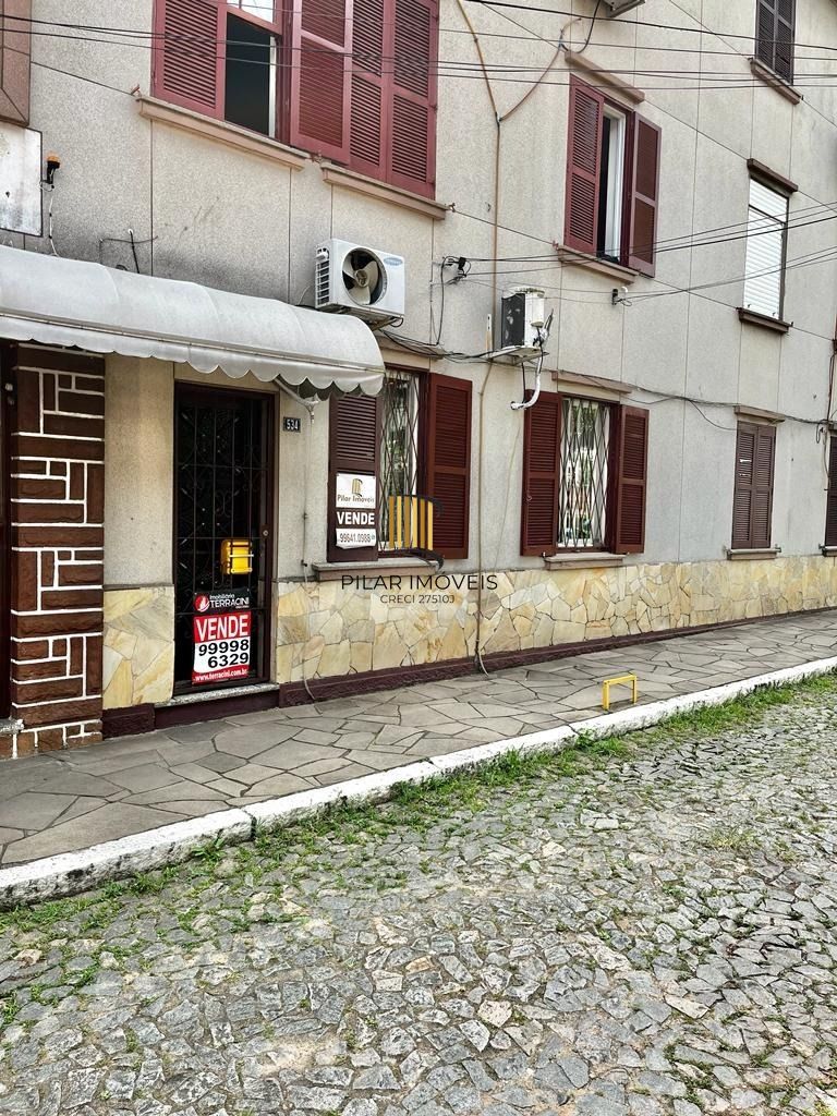 Vende-se apto térreo, com 03 dormitórios, sala com 02 ambientes - Pilar Imóveis