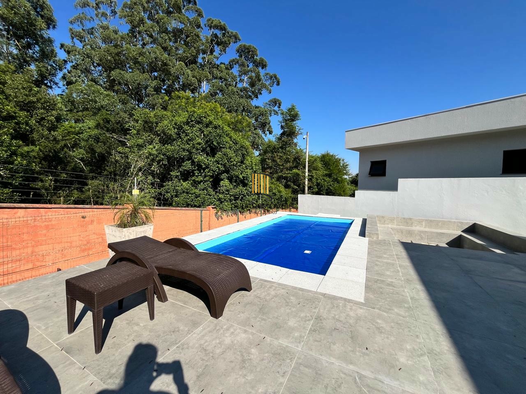 Casa de Condomínio 4 dormitórios no bairro Vila Nova