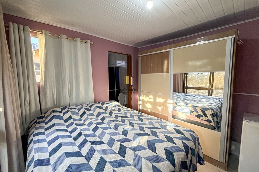 Casa 3 dormitórios no bairro Igara