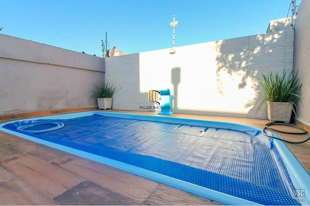 Casa 3 dormitórios no bairro Hípica