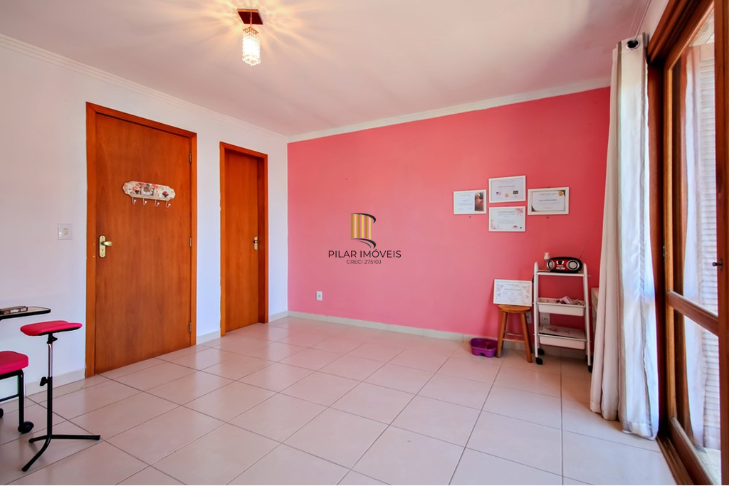 Casa 3 dormitórios no bairro Guarujá