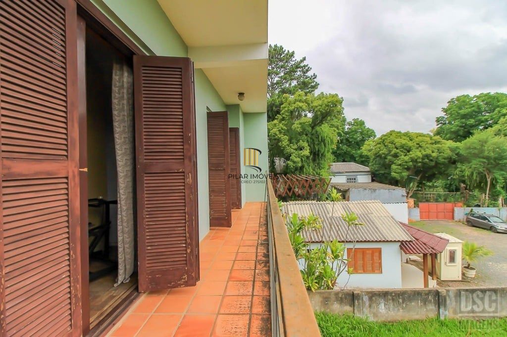 Casa 3 dormitórios no bairro Glória