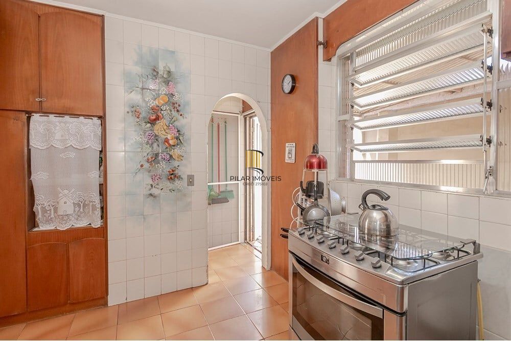 Casa 4 dormitórios no bairro Camaquã