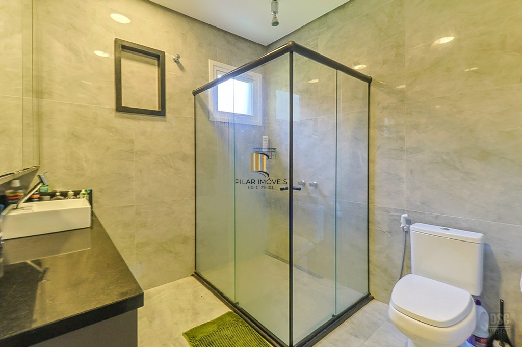 Casa 5 dormitórios no bairro Ipanema