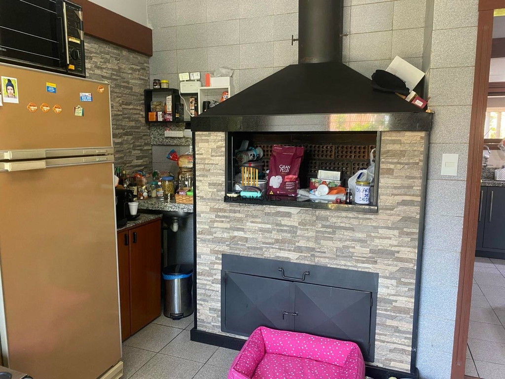 Casa 5 dormitórios no bairro Chácara das Pedras