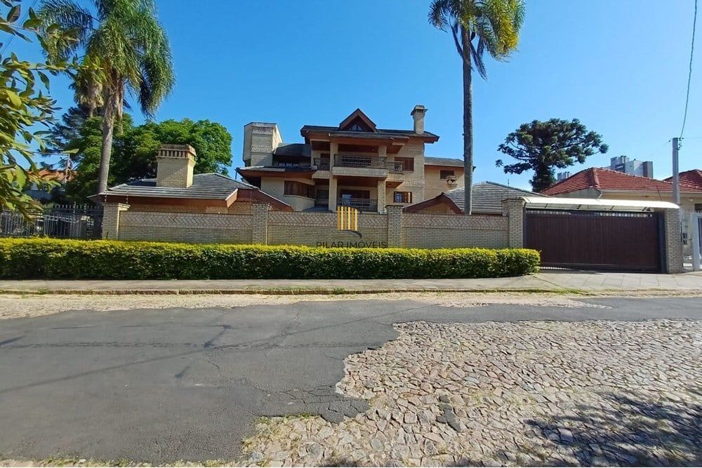 Casa 4 dormitórios no bairro Partenon