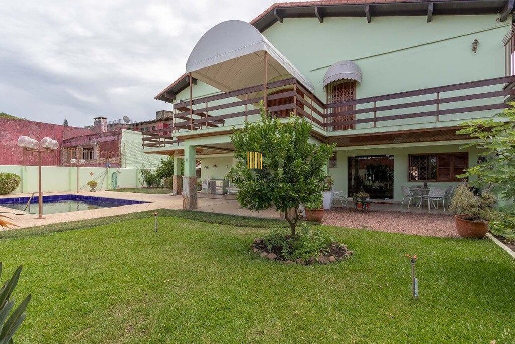 Casa 4 dormitórios no bairro Vila Assunção