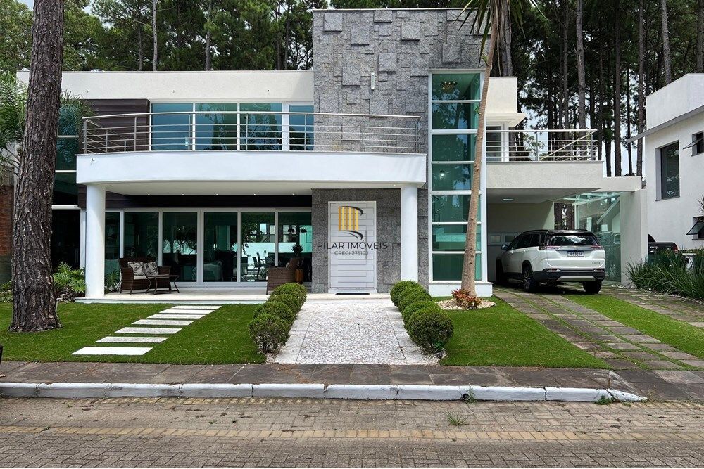 Casa de Condomínio 4 dormitórios no bairro Praia de Atlântida - Pilar Imóveis