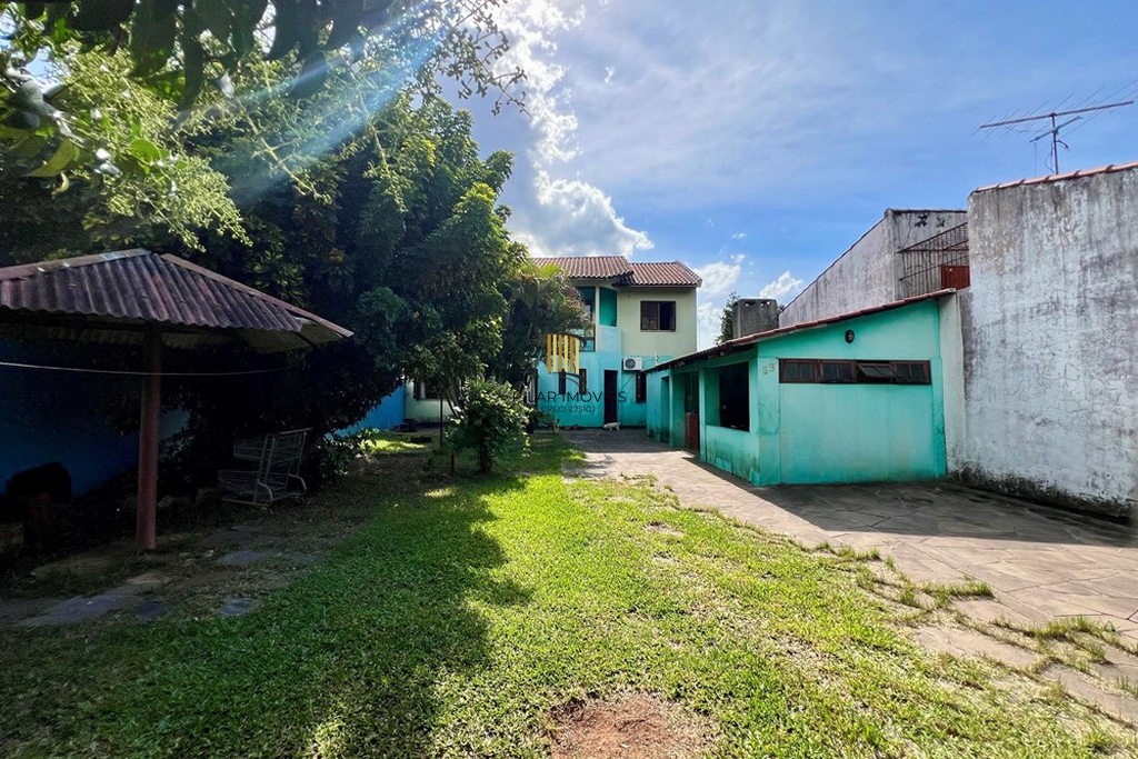 Casa 4 dormitórios no bairro Igara - Pilar Imóveis