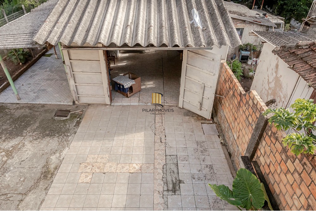 Casa 5 dormitórios no bairro Glória