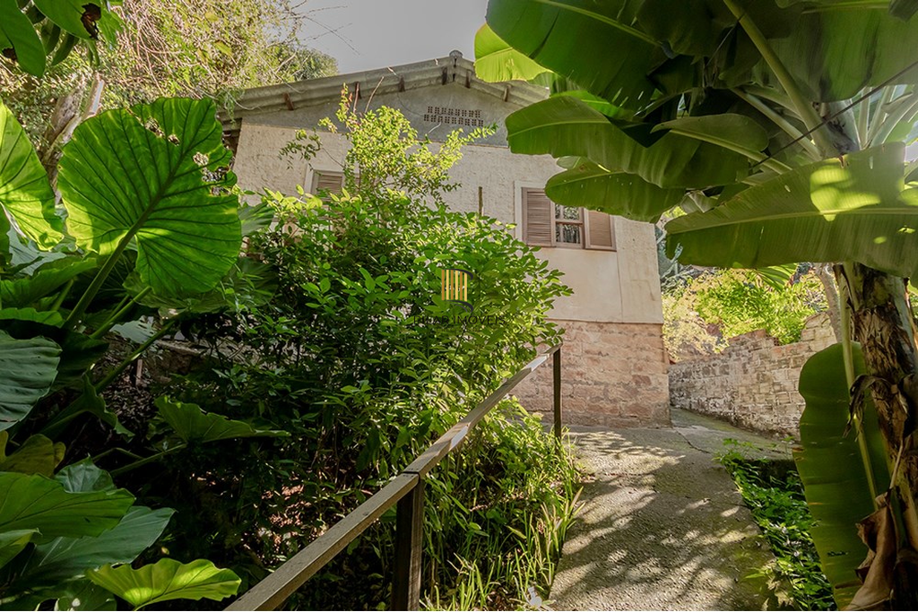 Casa 5 dormitórios no bairro Glória