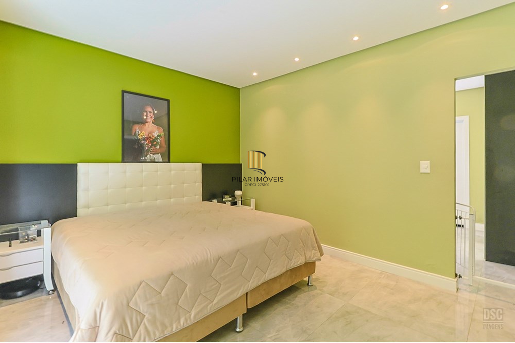 Casa 5 dormitórios no bairro Ipanema