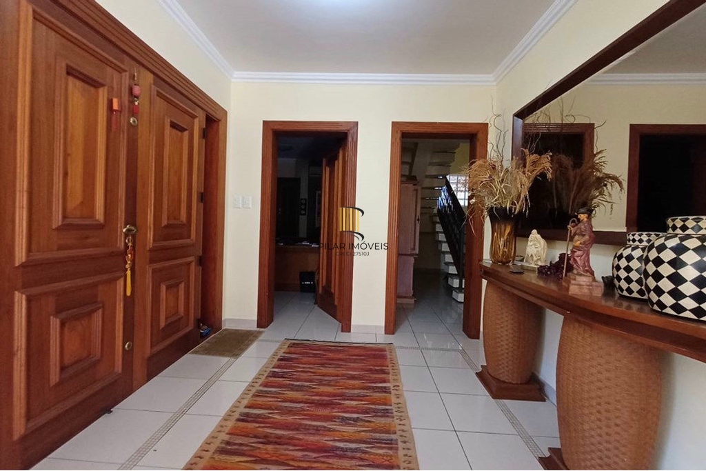 Casa 4 dormitórios no bairro Partenon