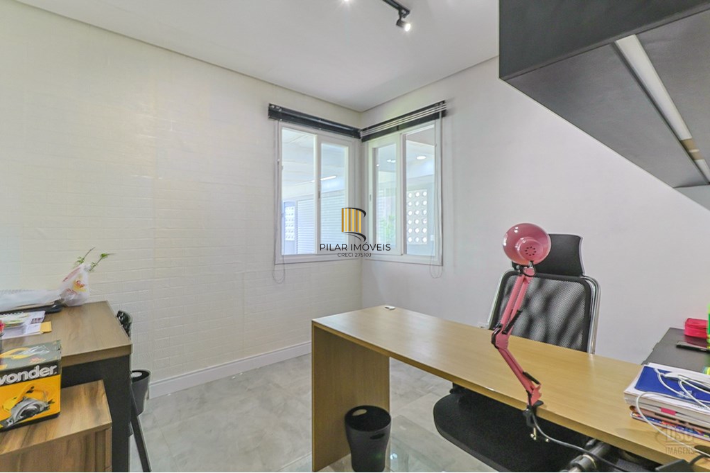 Casa 5 dormitórios no bairro Ipanema