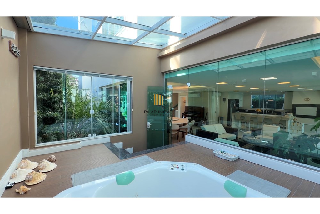 Casa de Condomínio 4 dormitórios no bairro Morada do Sol