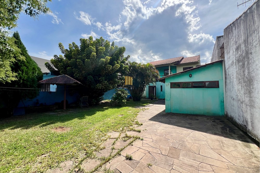 Casa 4 dormitórios no bairro Igara