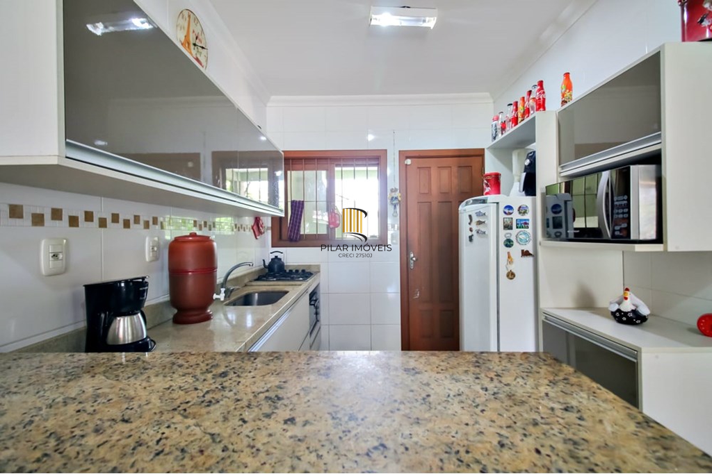 Casa 3 dormitórios no bairro Guarujá