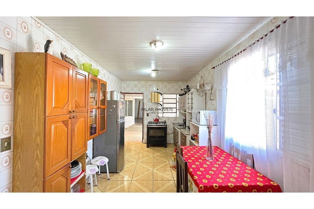 Casa 3 dormitórios no bairro Partenon