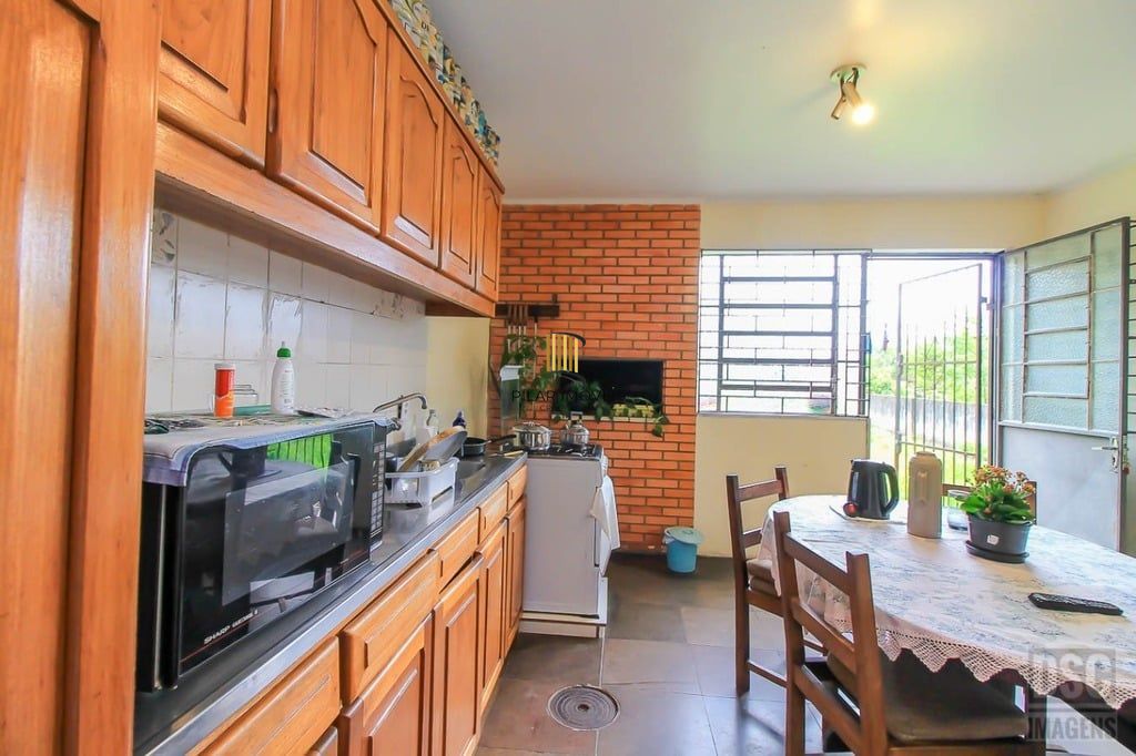 Casa 3 dormitórios no bairro Glória