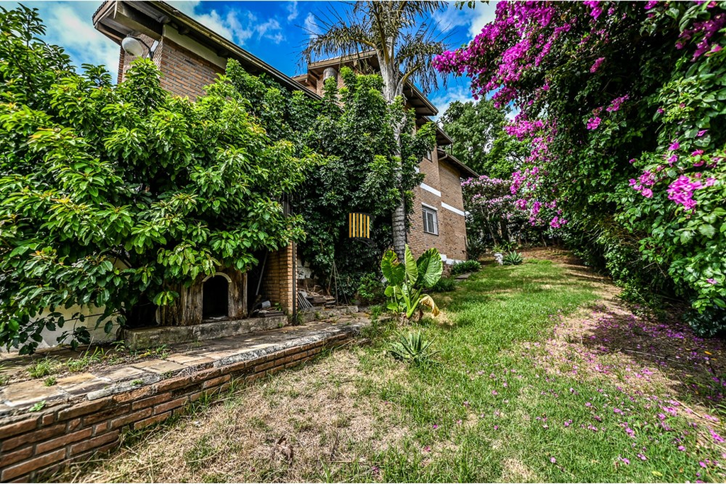 Casa 4 dormitórios no bairro Ipanema