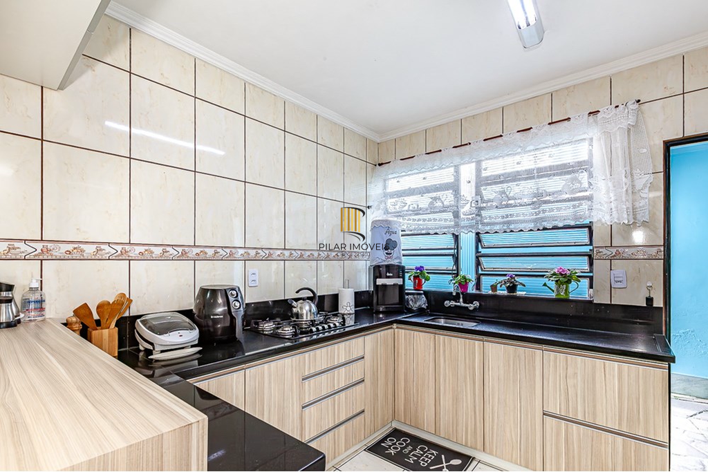 Casa 5 dormitórios no bairro Vila Ipiranga