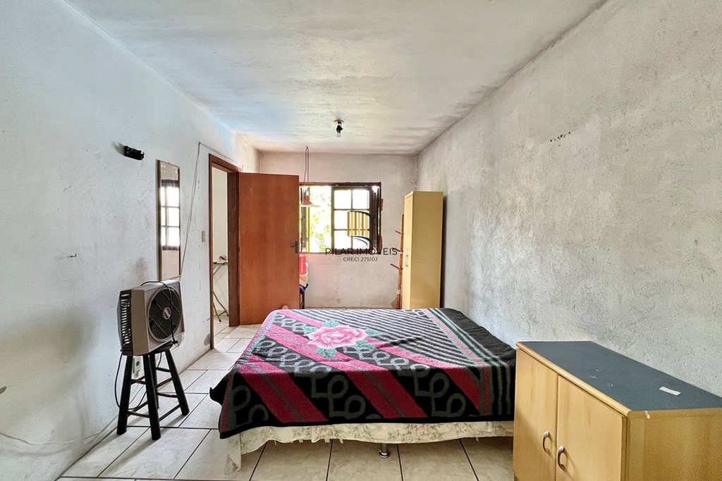 Casa 4 dormitórios no bairro Igara