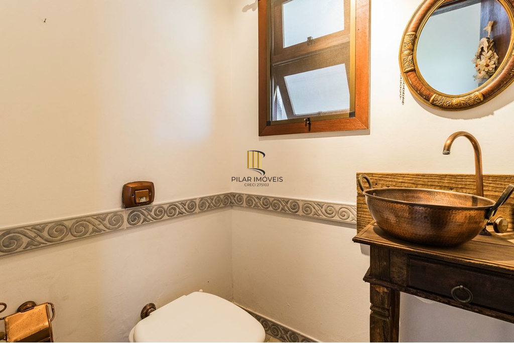 Casa 3 dormitórios no bairro Guarujá