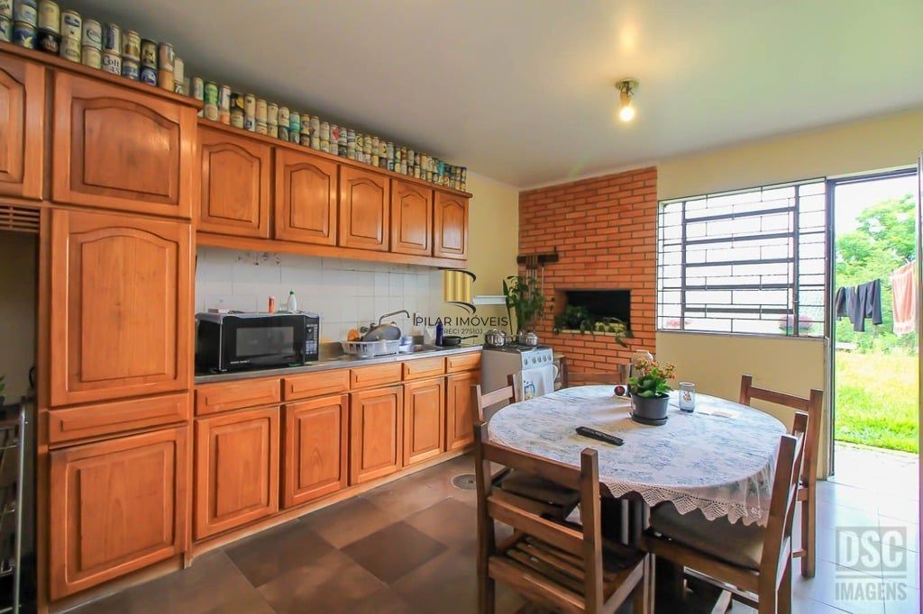 Casa 3 dormitórios no bairro Glória