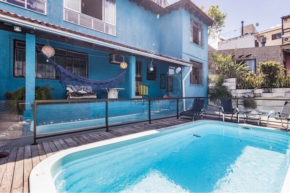 Casa 4 dormitórios no bairro Partenon - Pilar Imóveis