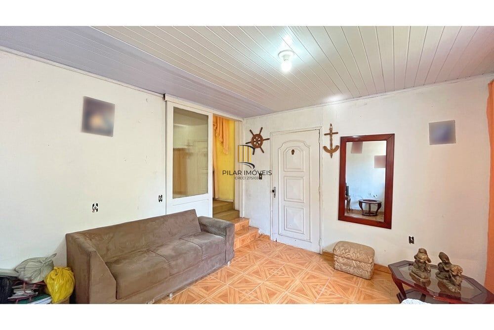 Casa 3 dormitórios no bairro Partenon