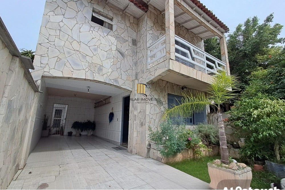 Casa 3 dormitórios no bairro Jardim Algarve