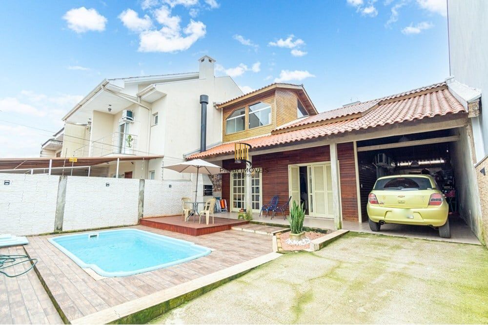 Casa 3 dormitórios no bairro Igara