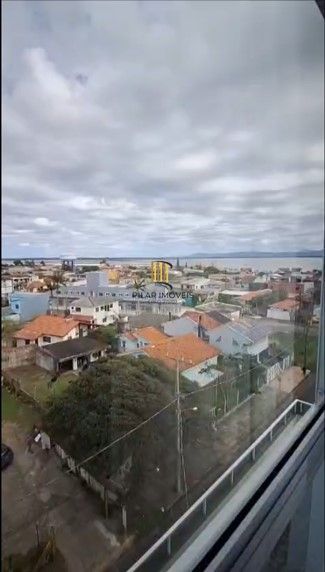 Apartamento, 2 dormitórios, 1 vaga coberto, churrasqueira no centro de Tramandaí