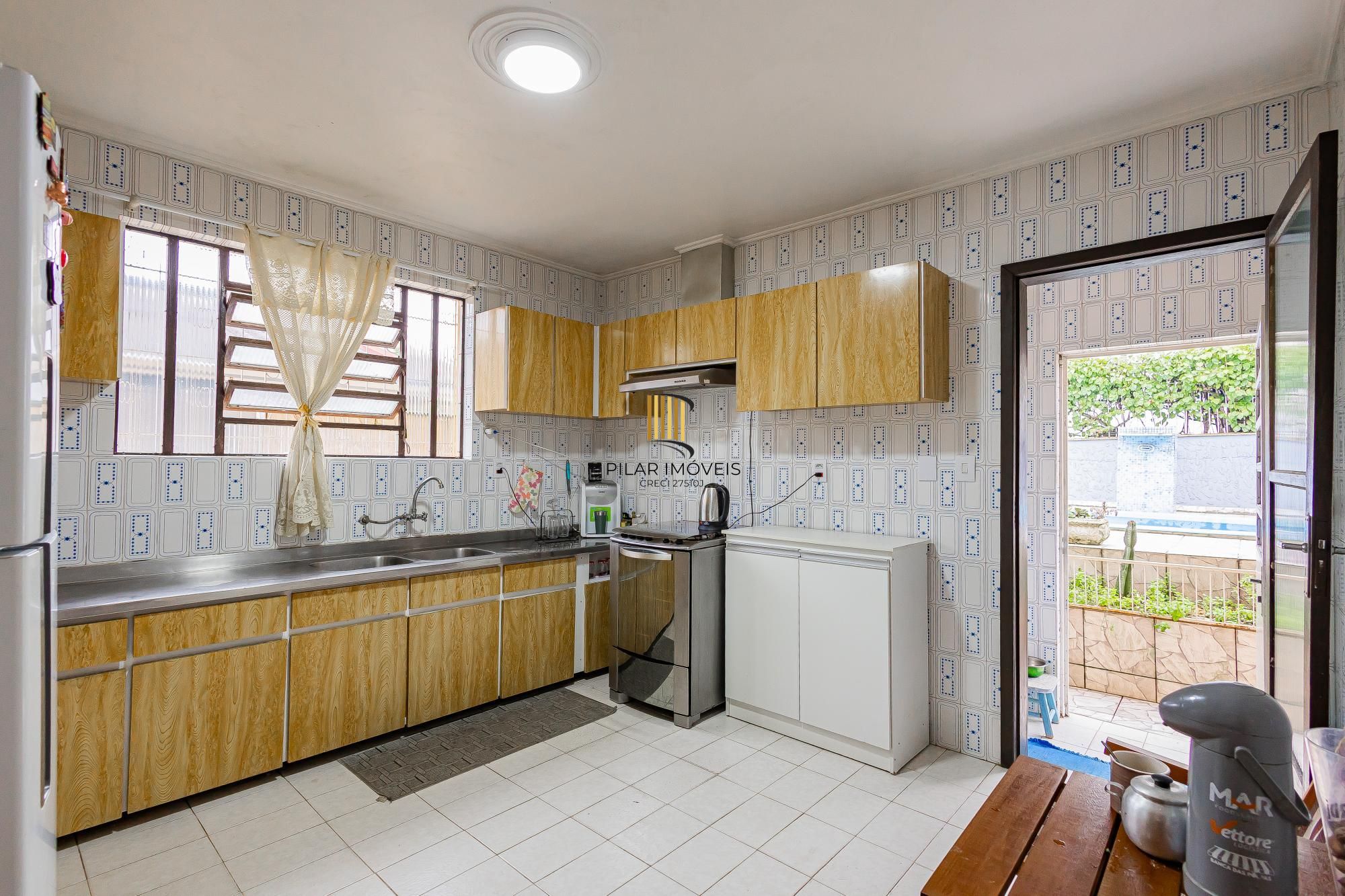 Casa 5 dormitórios no bairro Parque Santa Fé