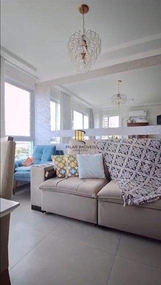 Apartamento, 2 dormitórios, 1 vaga coberto, churrasqueira no centro de Tramandaí