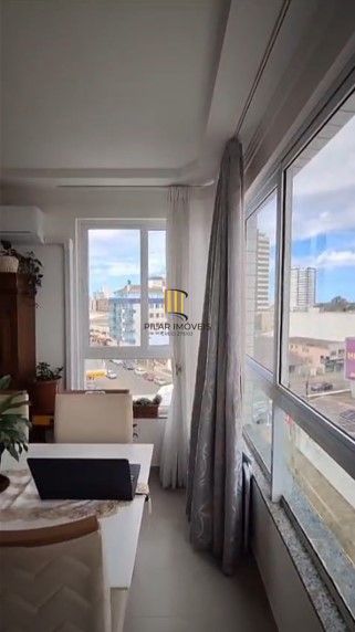 Apartamento, 2 dormitórios, 1 vaga coberto, churrasqueira no centro de Tramandaí