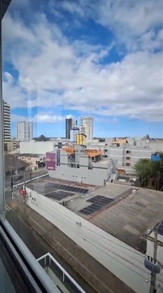 Apartamento, 2 dormitórios, 1 vaga coberto, churrasqueira no centro de Tramandaí