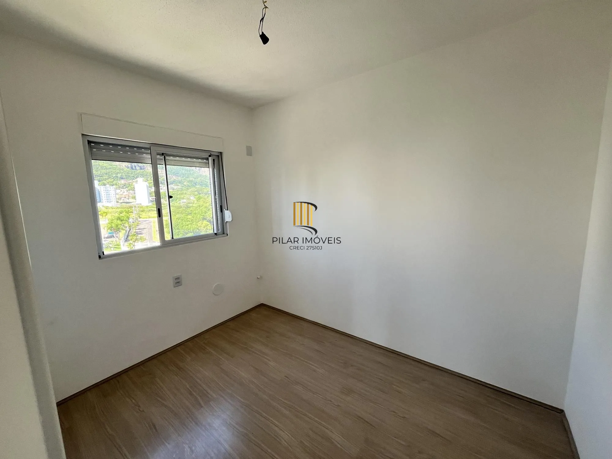 Apartamento de 2 quartos e 1 vaga de garagem no bairro Morro Santana em POA