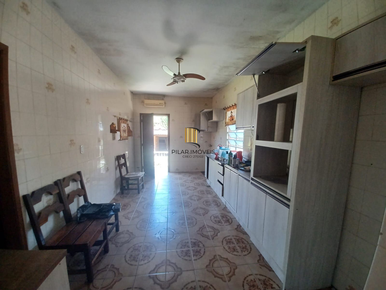 Casa de 3 quartos, suíte e patio no bairro Medianeira em POA