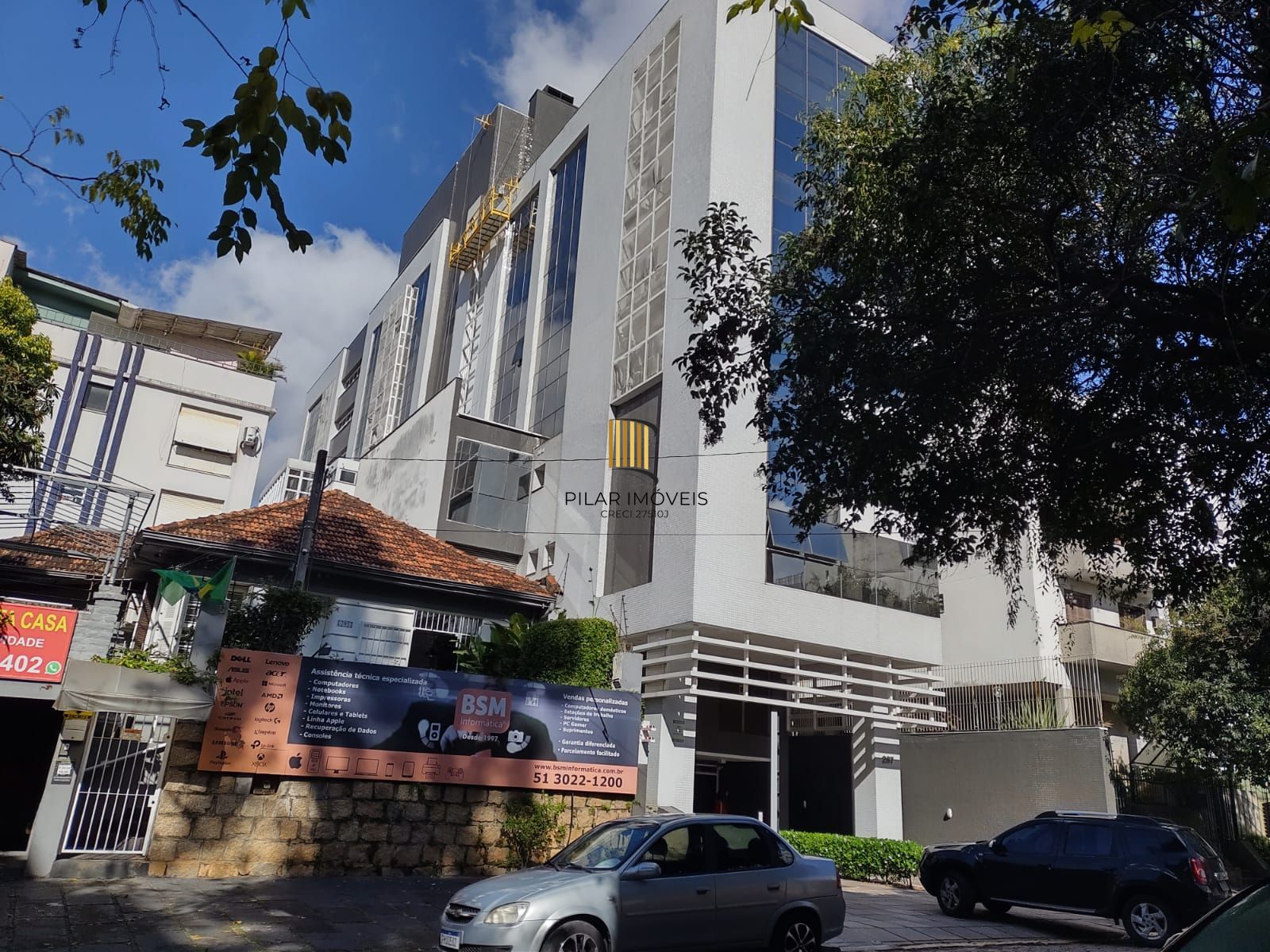 Sala comercial com 2 vagas de garagem escrituradas