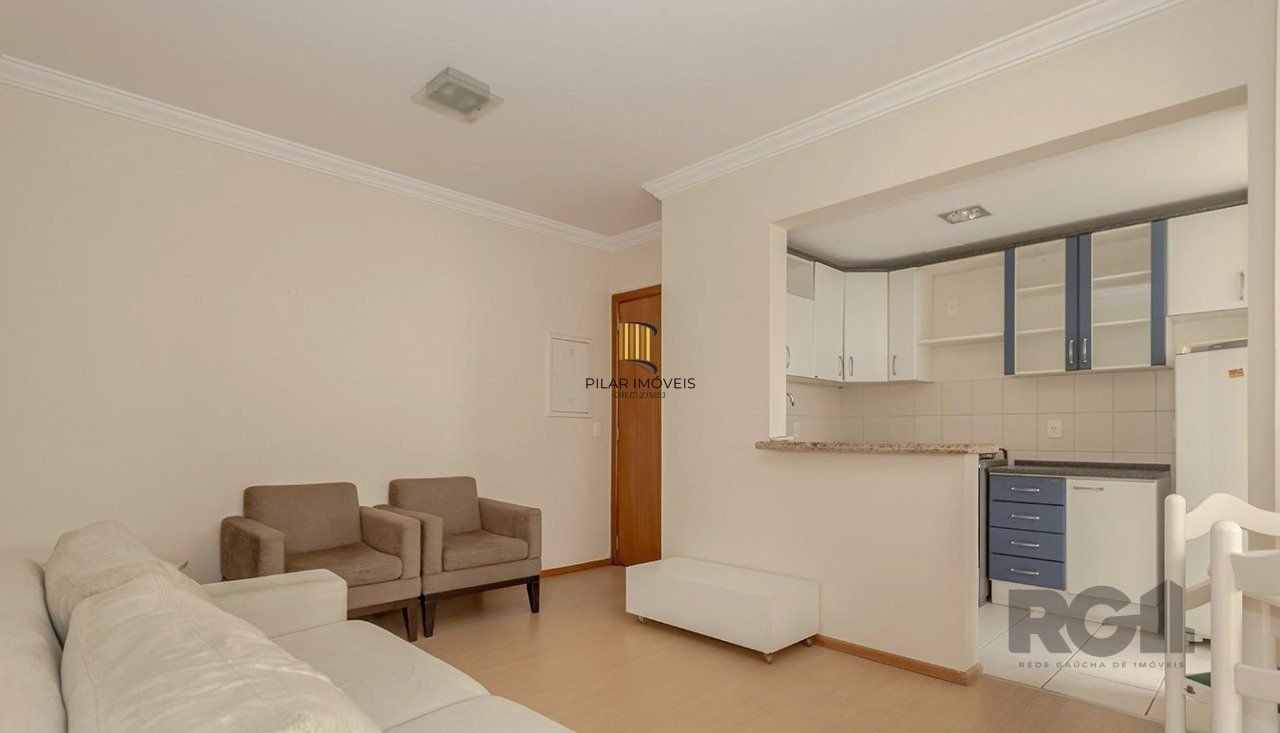   Apartamento de um quarto, suíte e uma vaga de garagem no bairro Menino Deus em Porto Alegre.