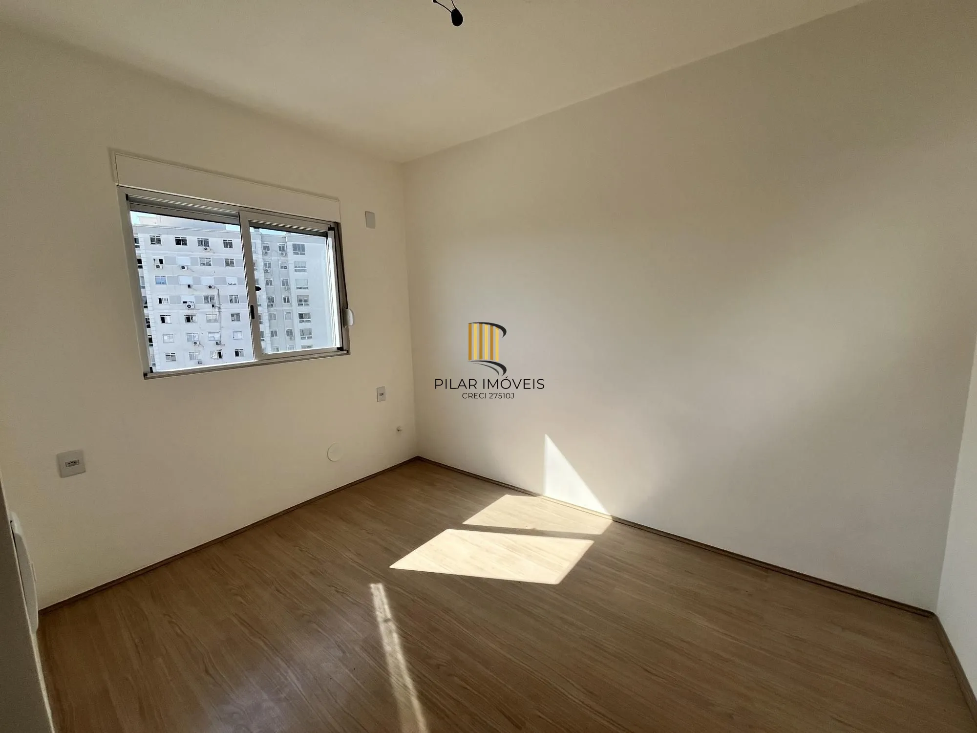 Apartamento de 2 quartos e 1 vaga de garagem no bairro Morro Santana em POA