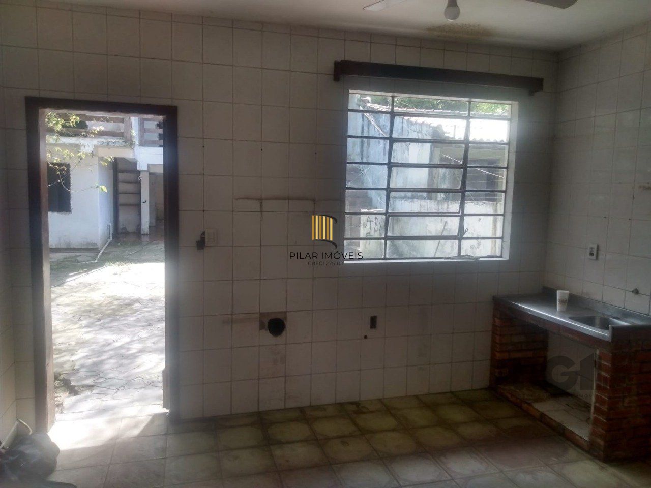 Casa 3 dormitórios no bairro Guarujá