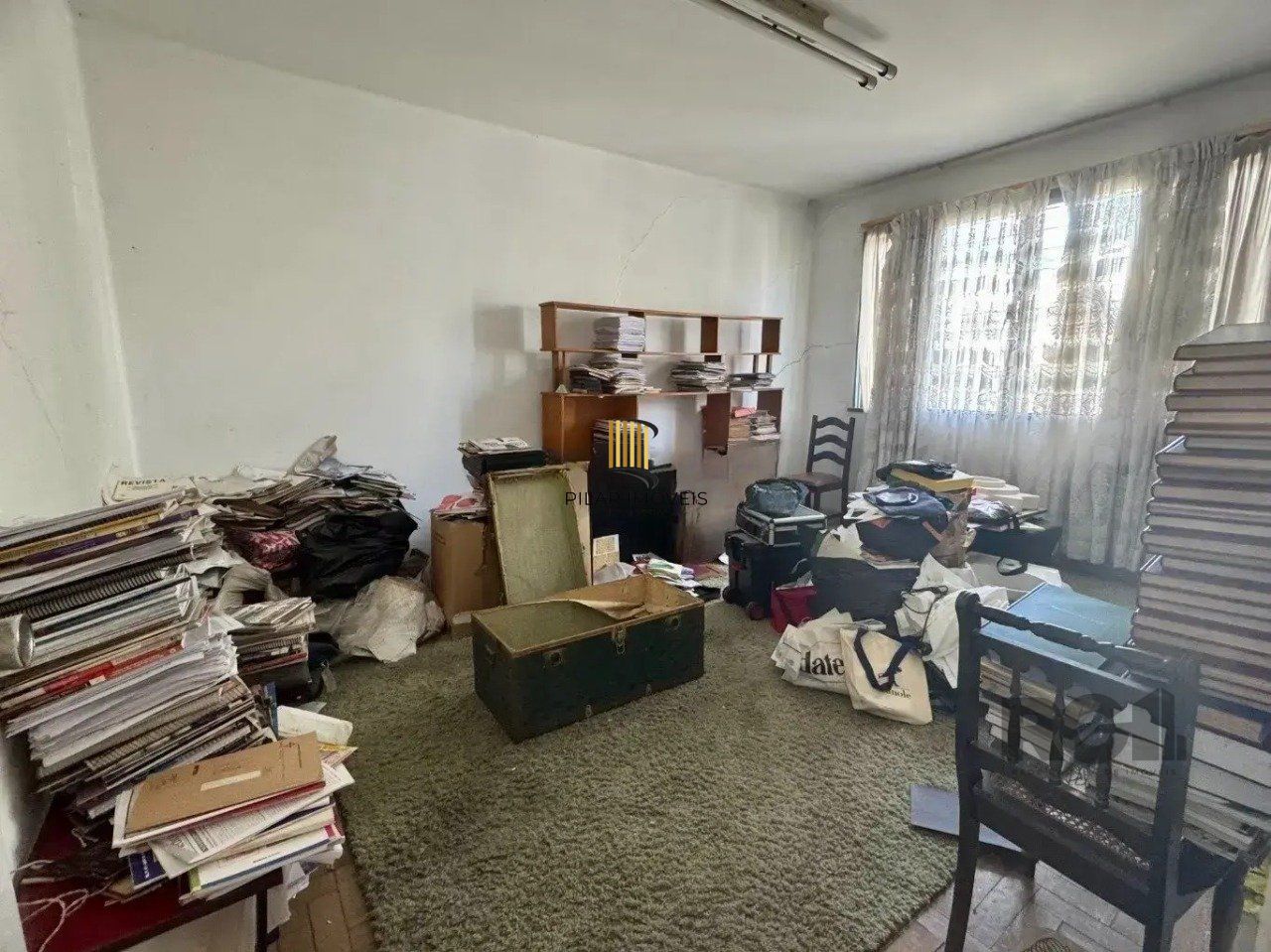 Casa de 5vquartos e 3 vagas de garagem no bairro Santana em Porto Alegre