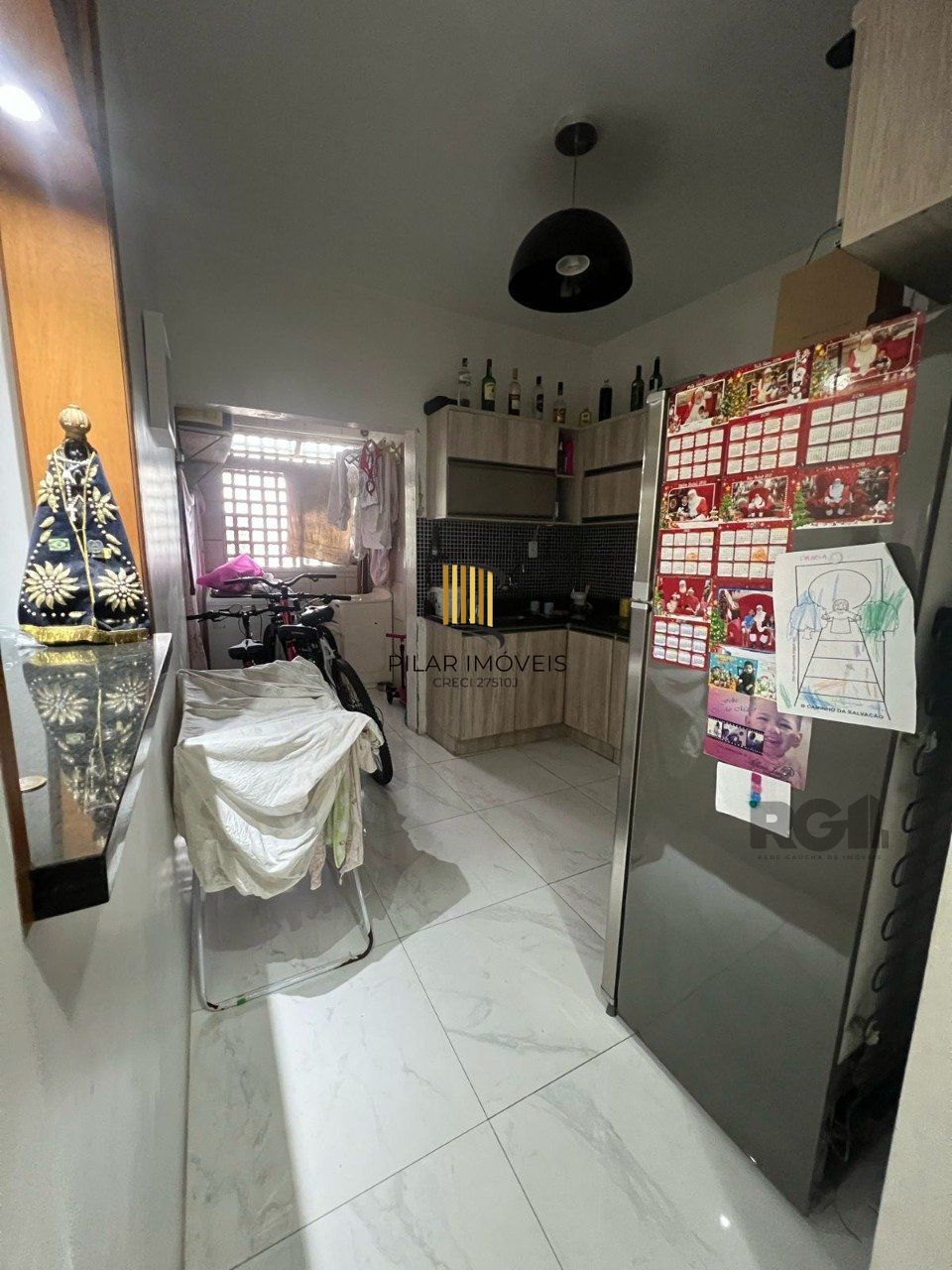 Apartamento de dois quartos no bairro Jardim Botânico em Porto Alegre.