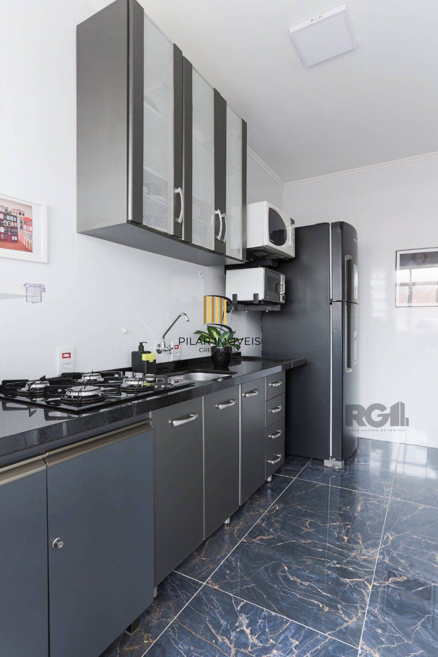 Apartamento de dois quartos no bairro Farroupilha em Porto Alegre.