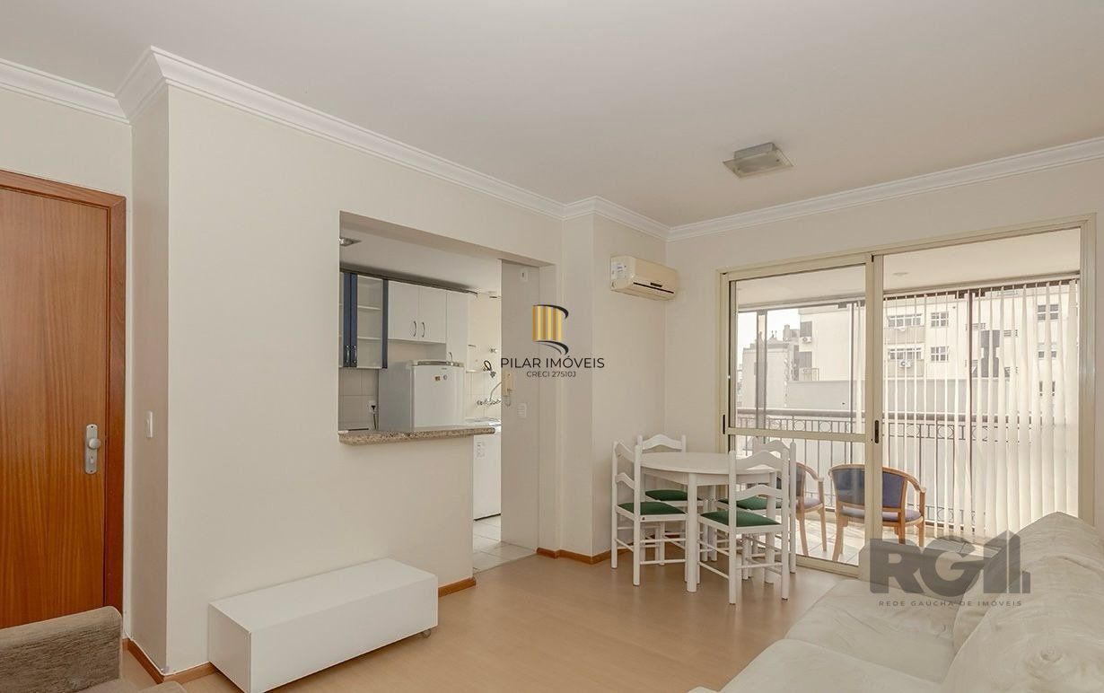   Apartamento de um quarto, suíte e uma vaga de garagem no bairro Menino Deus em Porto Alegre.