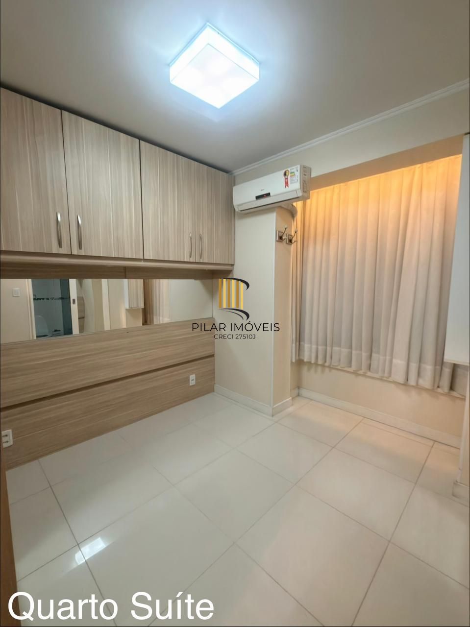 Apartamento de 2 quartos, suíte e 1 vaga de garagem no bairro Menino Deus em POA